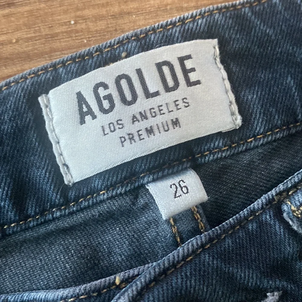 AGOLDE Dark skinny stretch distressed jeans size 26 mid rise. Busted knee